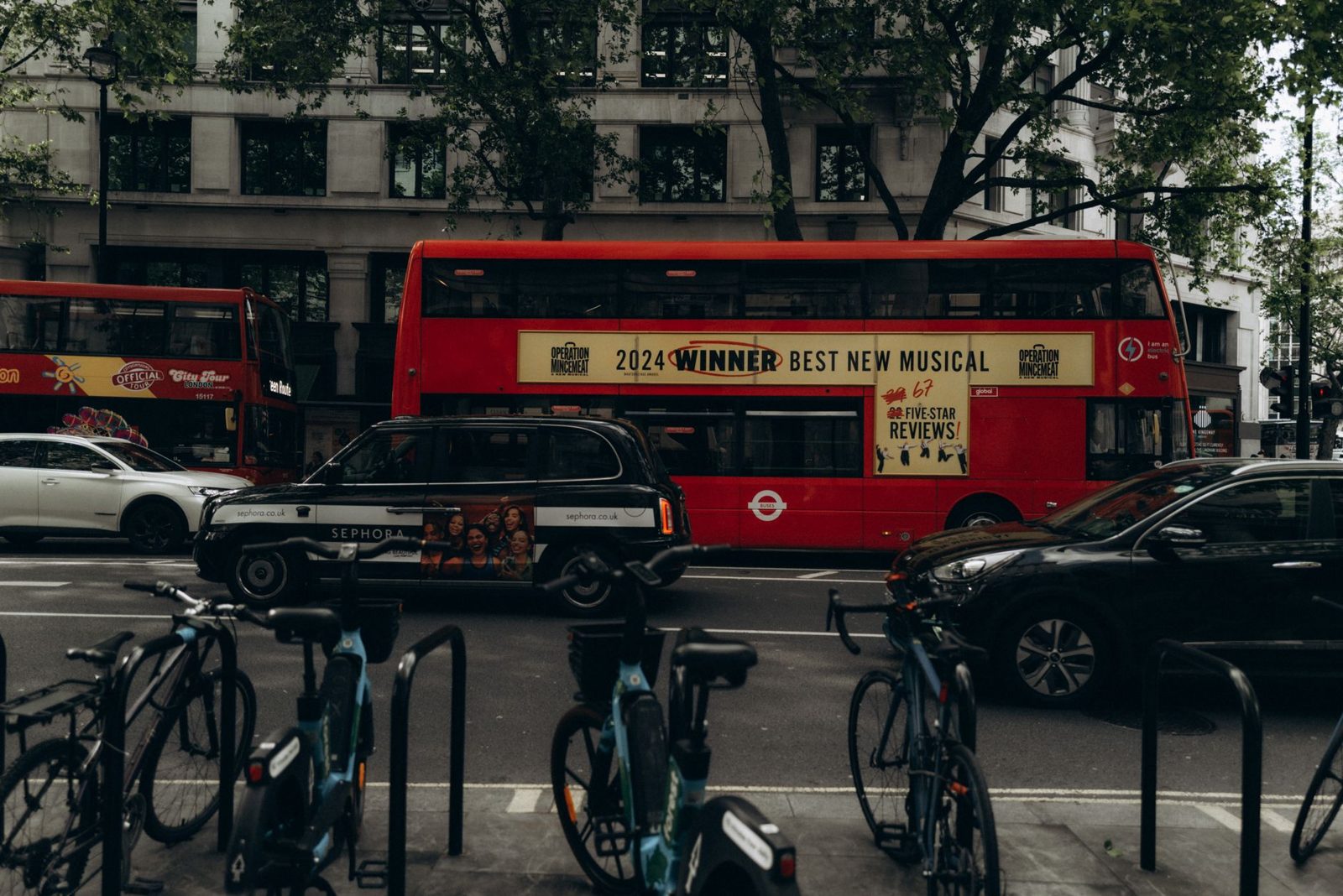 Red double-decker bus on a London street